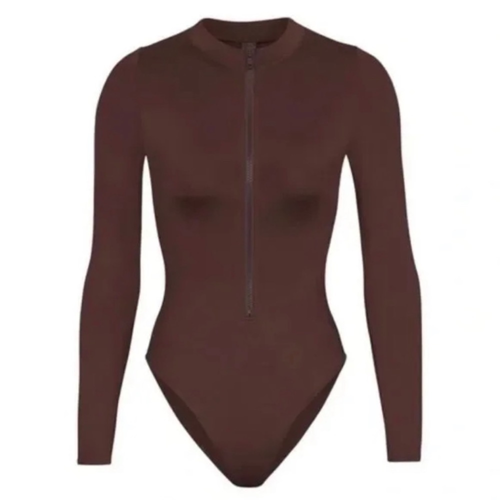 NWT skims zip up swim body suit